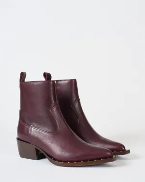 leather upper with studs foxing